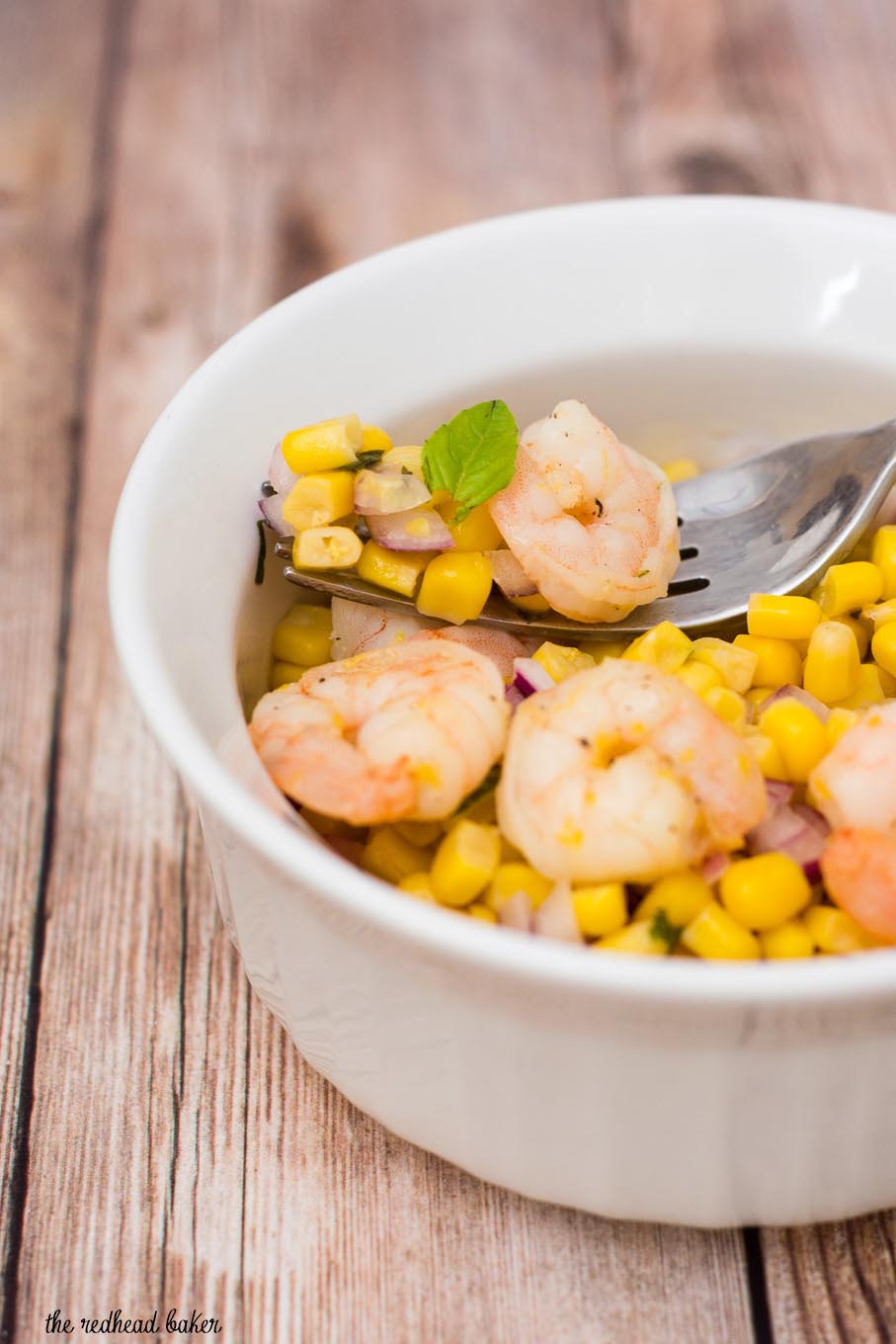 Can dinner be both easy AND healthy? Yes! Serve lemon shrimp over a salad of corn, red onion and basil with a red wine vinaigrette.
