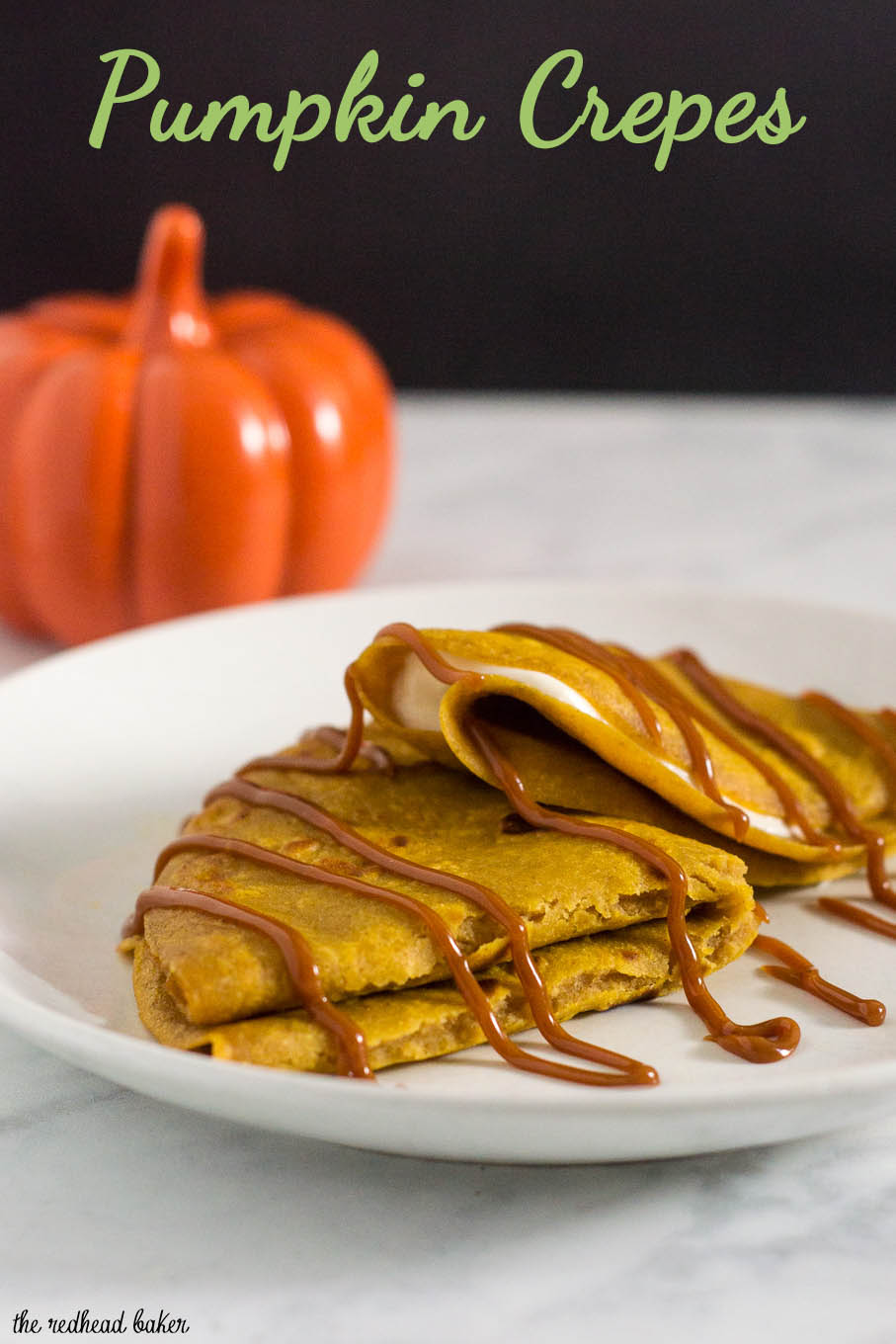 Pumpkin crepes are very thin dessert pancakes, folded over sweetened cream cheese filling and drizzled with dulce de leche. #PumpkinWeek
