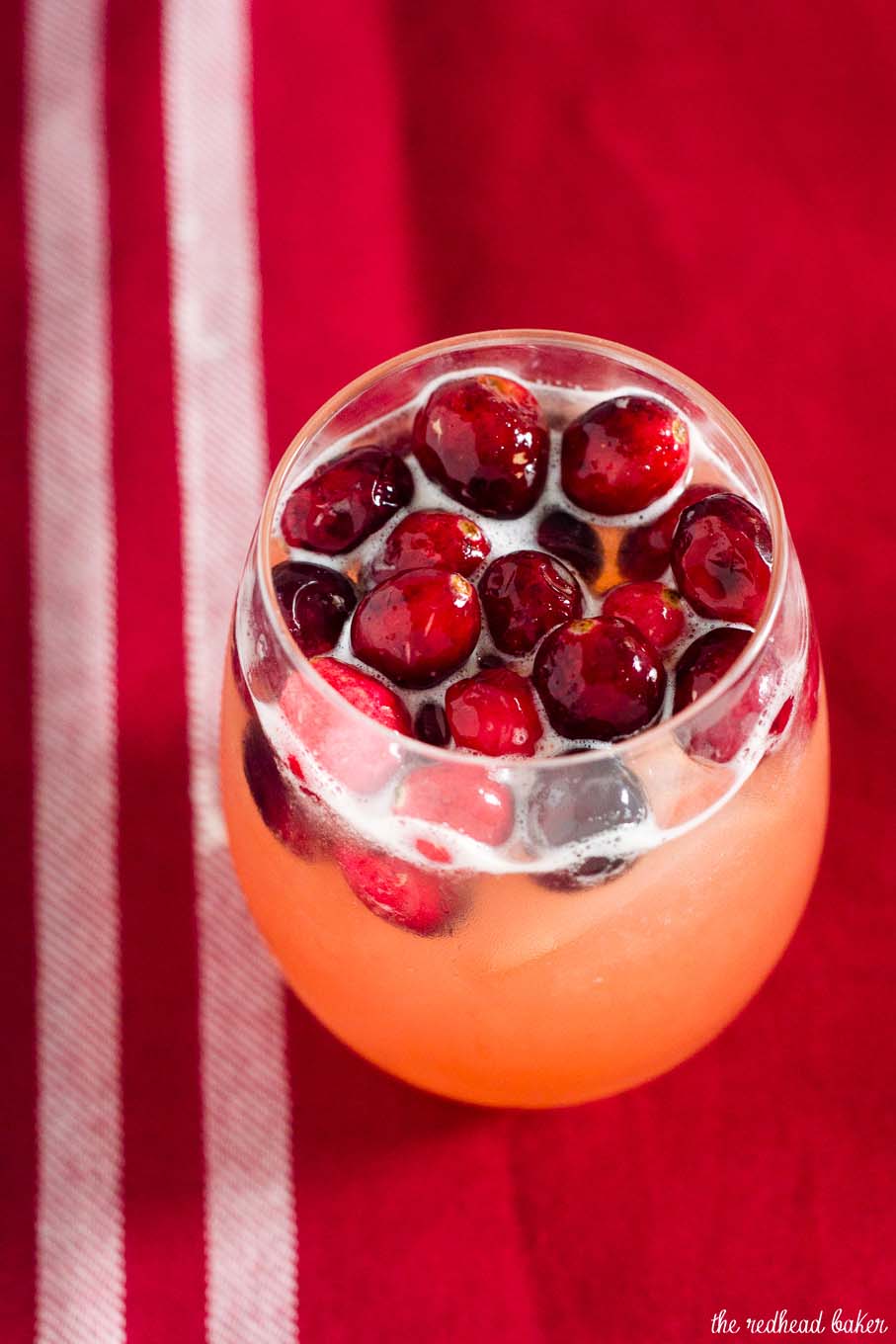 Cranberry cinnamon whiskey sour is an easy, festive cocktail for the Christmas season. Shake up a batch for your holiday party!