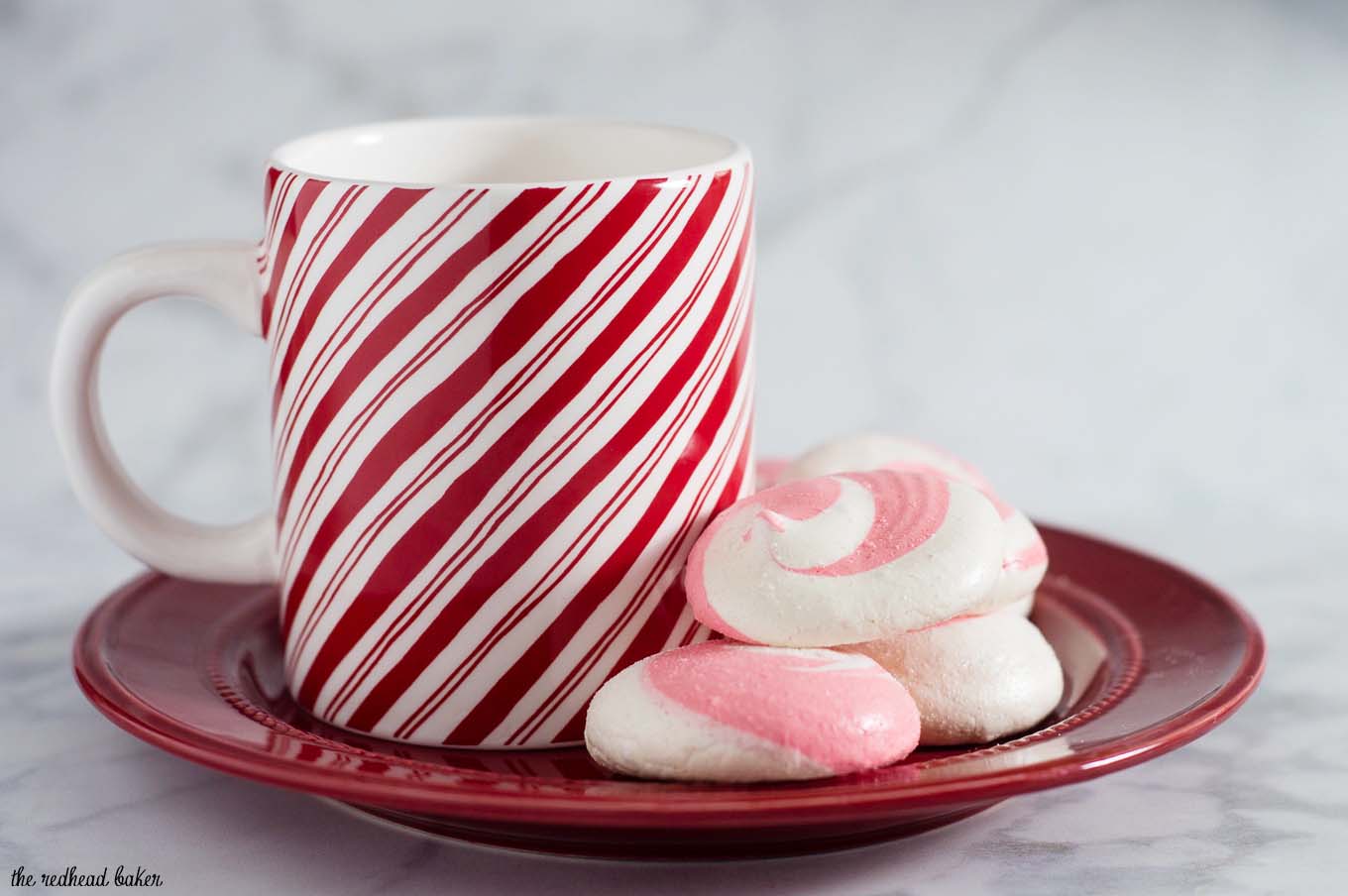 Beautiful swirled peppermint meringue cookies are a festive addition to your holiday party dessert tray! Bonus: they're naturally fat-free! #SundaySupper