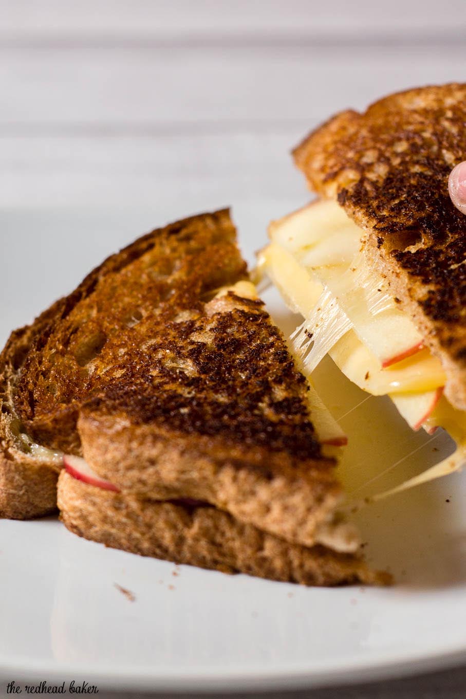 Thinly sliced honeycrisp apples add a sweet twist to classic grilled cheese. They are paired here with gouda, but cheddar would be delicious, too. #AppleWeek