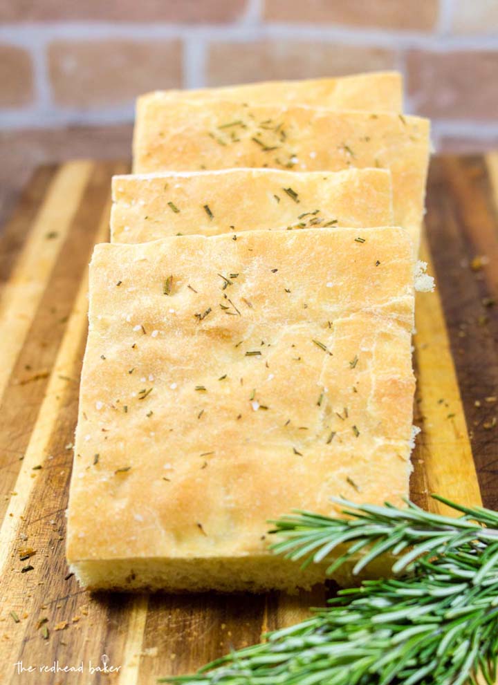 Focaccia is an Italian flat bread similar to the crust of Sicilian pizza. It is moist, chewy, and topped with savory rosemary. 
