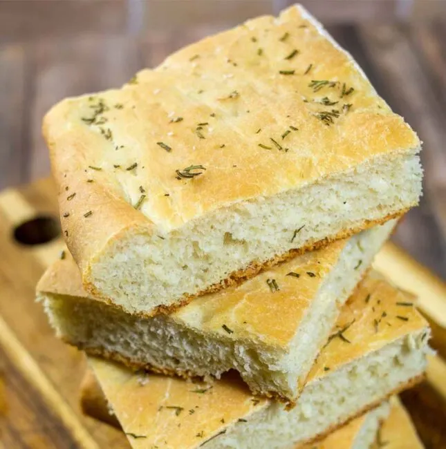 Focaccia is an Italian flat bread similar to the crust of Sicilian pizza. It is moist, chewy, and topped with savory rosemary.&nbsp;