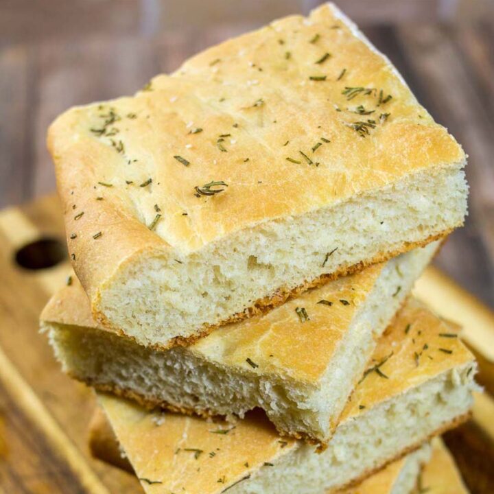 Focaccia is an Italian flat bread similar to the crust of Sicilian pizza. It is moist, chewy, and topped with savory rosemary. 