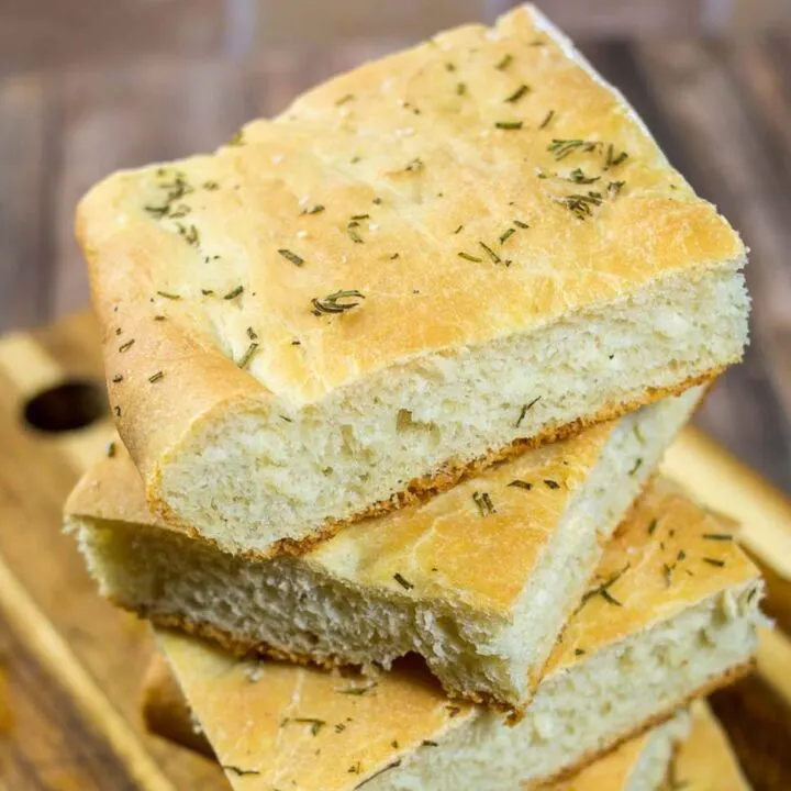Focaccia is an Italian flat bread similar to the crust of Sicilian pizza. It is moist, chewy, and topped with savory rosemary.