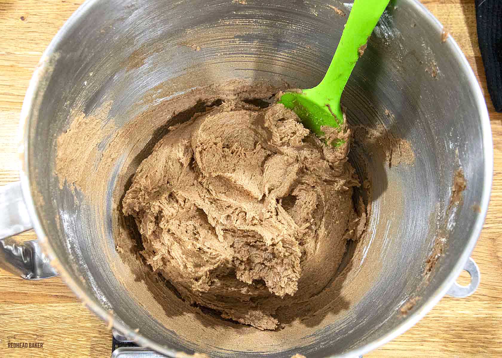 Raw nutella cookie dough in a mixing bowl. 