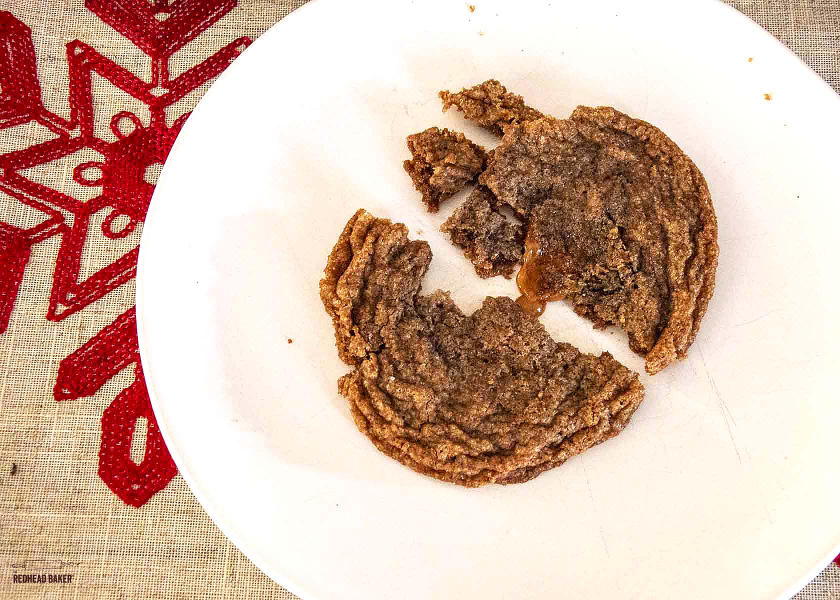 A broken Caramel Nutella Crisp showing the caramel center. 