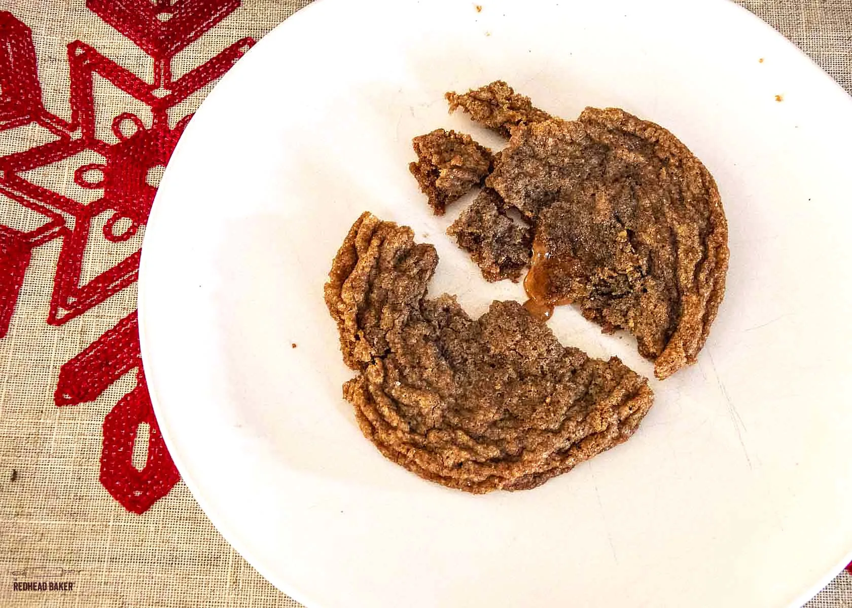 A broken Caramel Nutella Crisp showing the caramel center. 