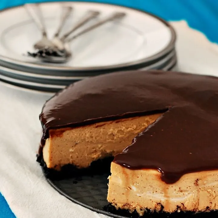 Peanut Butter Cheesecake with Nutella Ganache Topping by @TheRedheadBaker