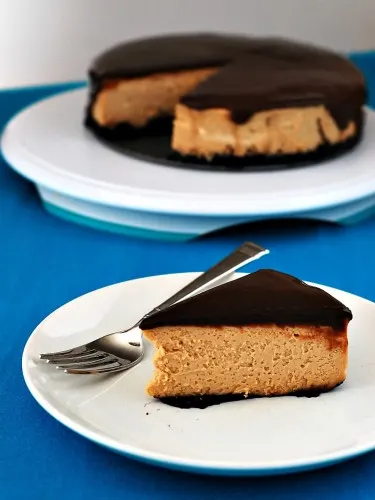 Peanut Butter Cheesecake with Nutella Ganache Topping by @TheRedheadBaker