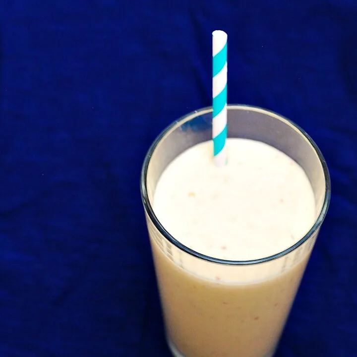 Peach Mango Breakfast Smoothie by @TheRedheadBaker