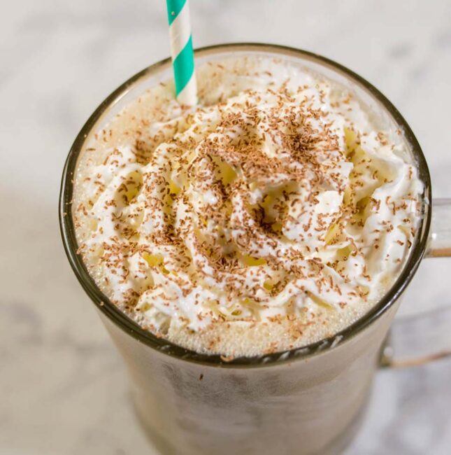 Enjoy the creamy White Russian cocktail as milkshakes! Coffee ice cream, milk, whipped cream vodka and coffee liqueur blend together in a frozen twist on the classic cocktail!