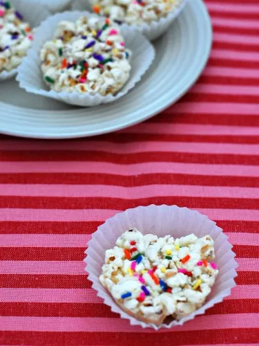 White Chocolate Funfetti Popcorn Balls by @TheRedheadBaker