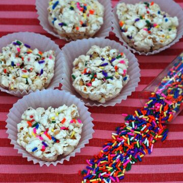 White Chocolate Funfetti Popcorn Balls by @TheRedheadBaker