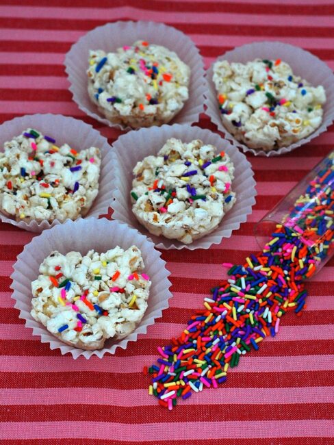 White Chocolate Funfetti Popcorn Balls by @TheRedheadBaker