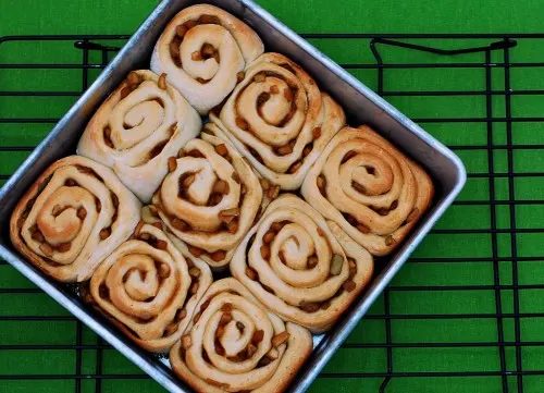 Caramel Apple Cinnamon Rolls | theredheadbaker.com