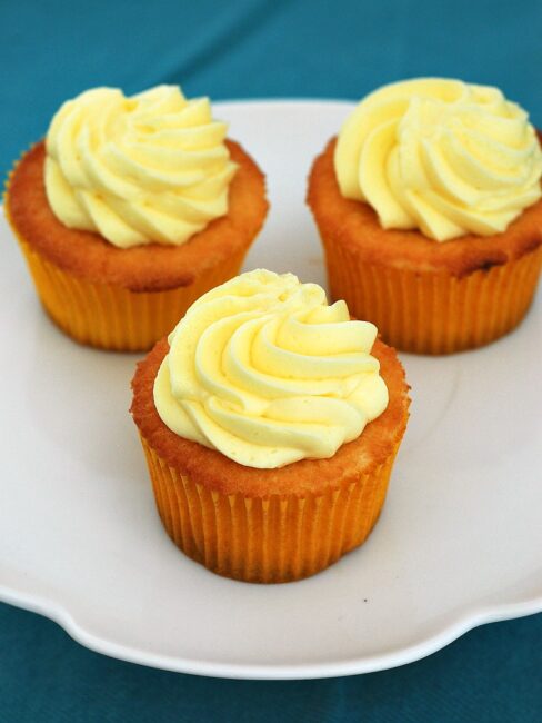 Vanilla Cupcakes with Lemon Curd Filling and Lemon Buttercream #SundaySupper #GalloFamily | theredheadbaker.com