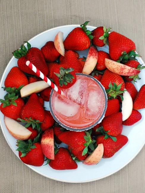 Set aside some fresh seasonal fruit for these strawberry-peach margaritas. They are light and refreshing, perfect for sipping on a warm summer night! 