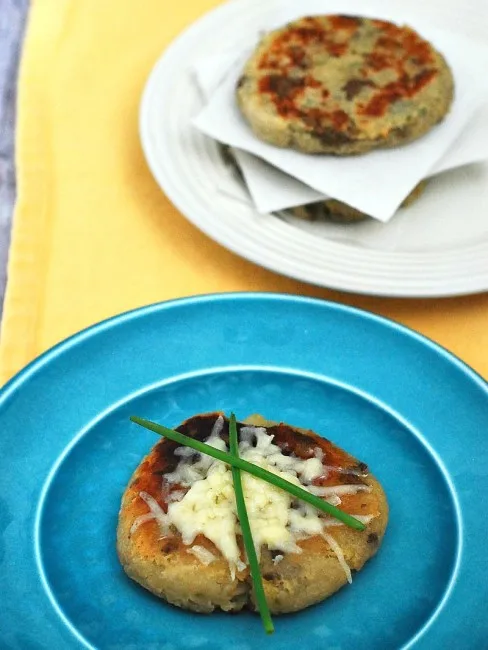 Scottish tattie scones, aka potato scones, resemble pancakes more than typical scones. They combine potatoes, flour, and butter and are sauteed on a griddle. #BrunchWeek theredheadbaker.com