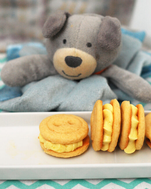 Babies are cute as a button, and so are these adorable little button cookies sandwiched with lemon buttercream! Serve them as a sweet ending to a baby shower. TheRedheadBaker.com