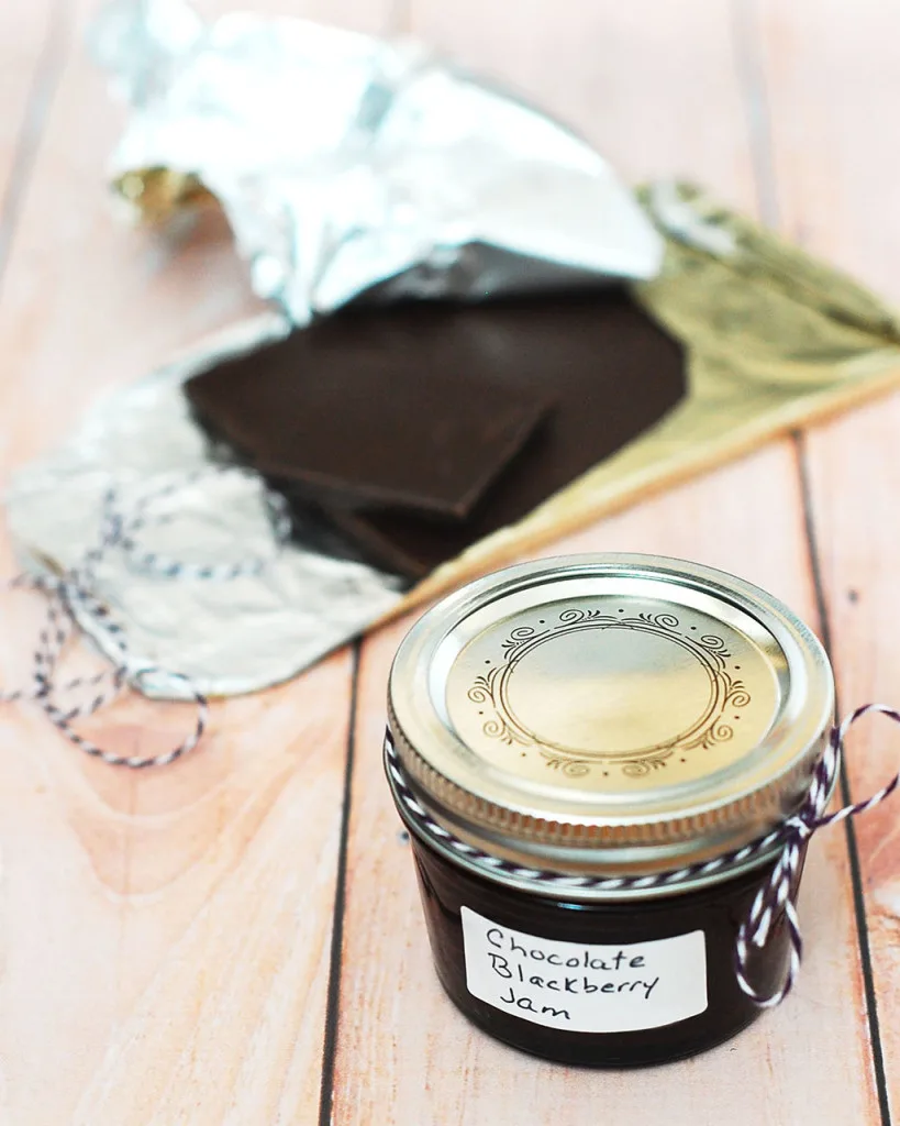 Preserve summer's plump, juicy blackberries in these decadent chocolate blackberry preserves — not quite jam, not quite sauce, but tastes delicious on everything. #SundaySupper TheRedheadBaker.com