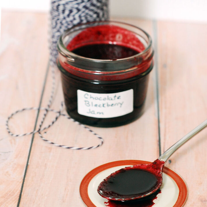 Preserve summer's plump, juicy blackberries in these decadent chocolate blackberry preserves — not quite jam, not quite sauce, but tastes delicious on everything. #SundaySupper TheRedheadBaker.com