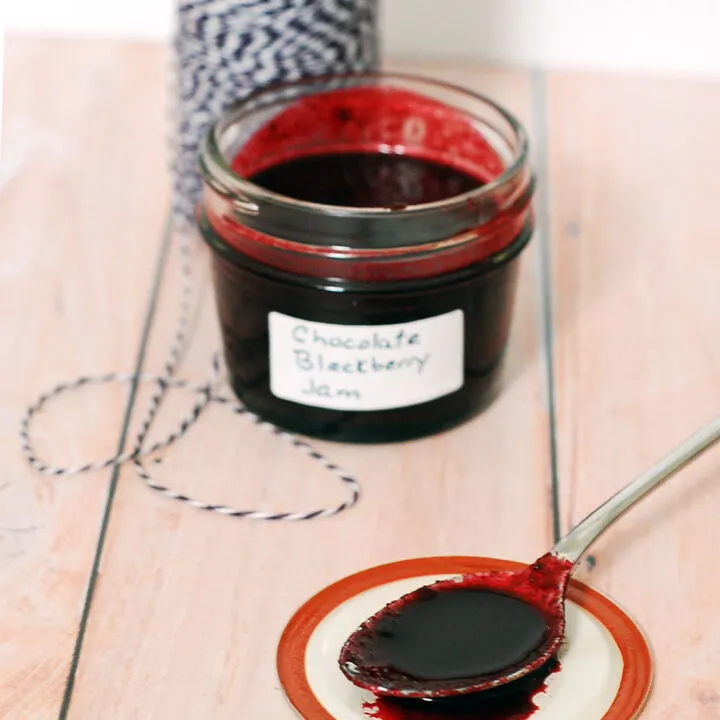 Preserve summer's plump, juicy blackberries in these decadent chocolate blackberry preserves — not quite jam, not quite sauce, but tastes delicious on everything. #SundaySupper TheRedheadBaker.com