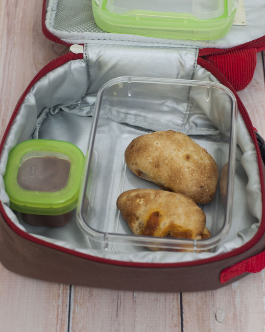 You'll be parent of the year when you send your kids back to school with mini pepperoni calzones. They're easy to make in bulk and freeze. #SundaySupper #TheRedheadBaker