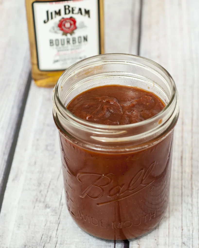 Making your own barbecue sauce is so easy, and lets you control the sugar as well as the flavor. This one is spicy and tangy with hints of Tennessee bourbon. #CLBlogger TheRedheadBaker.com