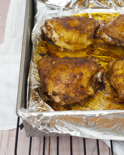 Pineapple juice, tequila and two kinds of chili powder add big flavors to moist chicken thighs. Shred leftovers (if there are any!) for tacos the next night. #CLBlogger TheRedheadBaker.com