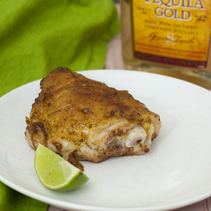 Pineapple juice, tequila and two kinds of chili powder add big flavors to moist chicken thighs. Shred leftovers (if there are any!) for tacos the next night. #CLBlogger TheRedheadBaker.com