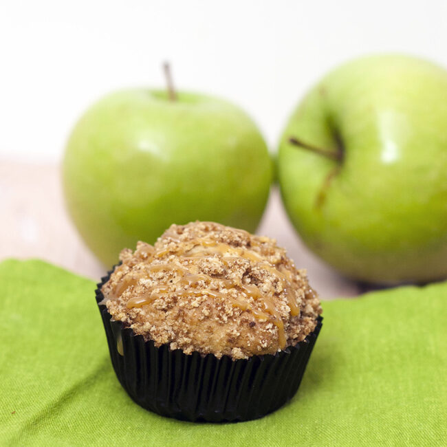 Autumn means apples are in season. Enjoy them in these easy-to-make quintessential fall breakfast muffins: caramel apple streusel muffins. #SundaySupper TheRedheadBaker.com