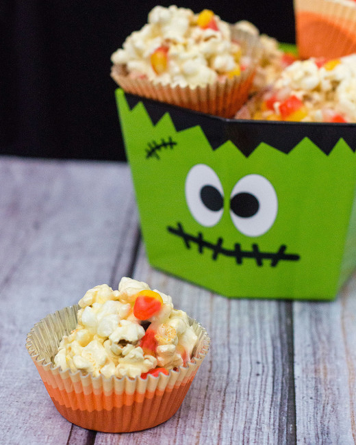 Need a last-minute, no-bake Halloween treat? Try these 5-ingredient candy corn popcorn balls! They're sweet and salty and perfect for all ages! TheRedheadBaker@gmail.com