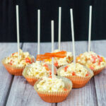Need a last-minute, no-bake Halloween treat? Try these 5-ingredient candy corn popcorn balls! They're sweet and salty and perfect for all ages! TheRedheadBaker@gmail.com