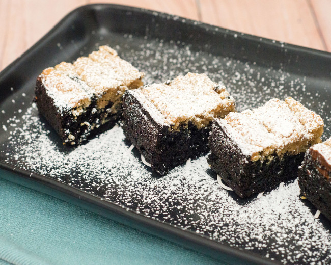 Creamy peanut butter cheesecake swirled with fudgy dark chocolate brownies makes for one decadent dessert. #OXOGoodCookie TheRedheadBaker.com