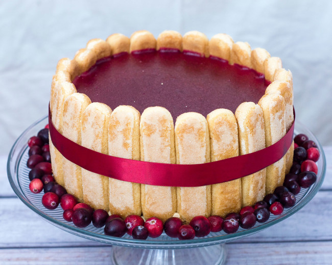 This make-ahead, no-bake cranberry apple charlotte cake will wow your holiday guests with its apple and cranberry flavors, and beautiful presentation. TheRedheadBaker.com