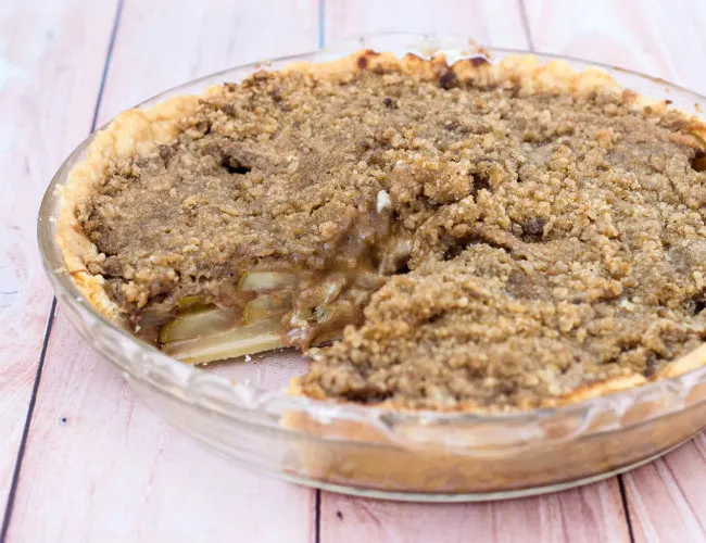Looking for a change from classic apple or pumpkin pie? Try this delicious spiced pear pie with hazelnut crumb topping. Serve slightly warm with a scoop of vanilla ice cream. TheRedheadBaker.com