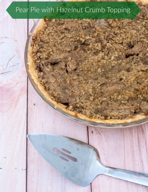 Looking for a change from classic apple or pumpkin pie? Try this delicious spiced pear pie with hazelnut crumb topping. Serve slightly warm with a scoop of vanilla ice cream. TheRedheadBaker.com