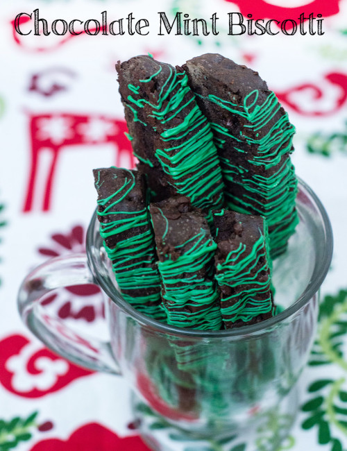 Italian-style biscotti is the perfect accompaniment for your afternoon cup of coffee! This cookie is flavored with dark chocolate cocoa powder and mint-flavored chocolate morsels. TheRedheadBaker.com #WhatsBaking