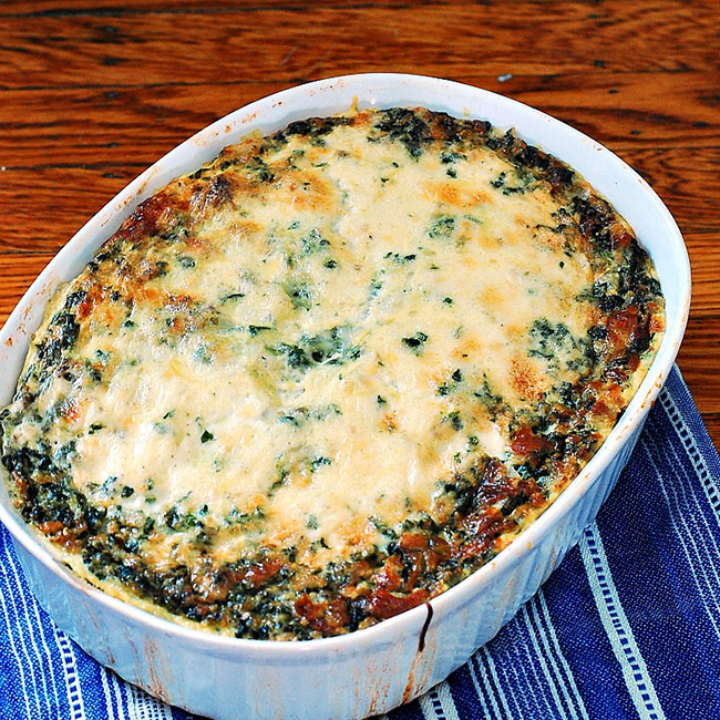 When I think of a casserole, I think of an oven-baked comfort dish. This is a breakfast casserole, with polenta, spinach, sausage and lots of cheese!