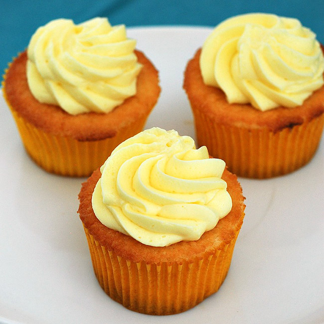 Baking cakes puts me in my happy place. I hope the moist, tender crumb of these cupcakes and the bright citrus filling and frosting will put you in a happy place, too.