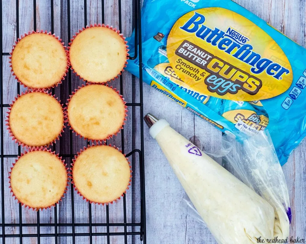 Turn your favorite cupcake recipe into these adorable Easter Basket Cupcakes, topped with @BUTTERFINGER® NestEggs! Kids of all ages will love them! #EggcellentTreats