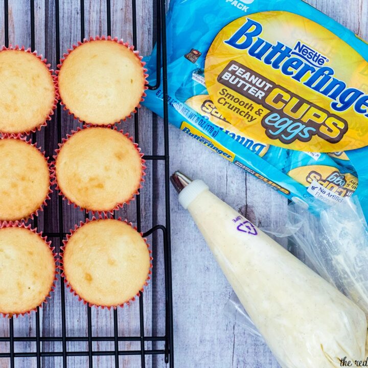 Turn your favorite cupcake recipe into these adorable Easter Basket Cupcakes, topped with @BUTTERFINGER® NestEggs! Kids of all ages will love them! #EggcellentTreats