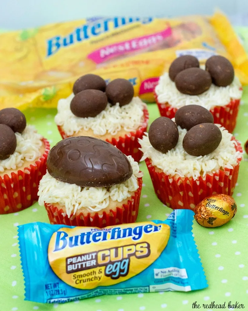 Turn your favorite cupcake recipe into these adorable Easter Basket Cupcakes, topped with @BUTTERFINGER® NestEggs! Kids of all ages will love them! #EggcellentTreats