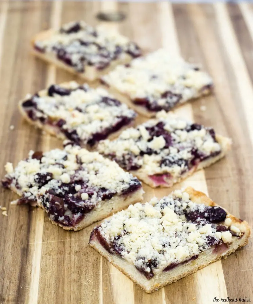 Cherry crumb bars are reminiscent of an American classic, cherry pie, but are less messy, so they're perfect for a potluck or picnic! #SundaySupper TheRedheadBaker