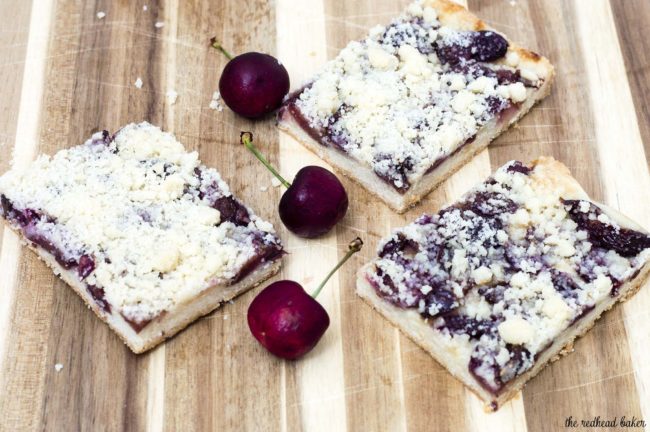 Cherry crumb bars are reminiscent of an American classic, cherry pie, but are less messy, so they're perfect for a potluck or picnic! #SundaySupper TheRedheadBaker