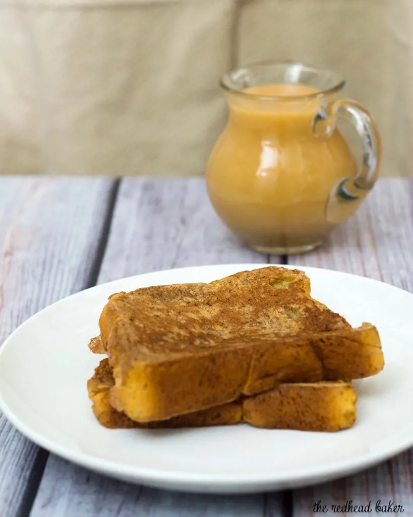 Rich slices of French toast are topped with vanilla-apple compote and caramel syrup. The compote and syrup can be made ahead and rewarmed before serving. #BrunchWeek TheRedheadBaker.com