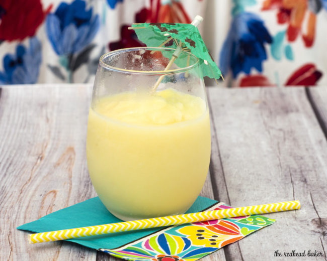 Have a taste of the tropics with a homemade frozen pina colada: a blend of ice, pineapple slices and juice, coconut cream and rum. #SundaySupper TheRedheadBaker.com