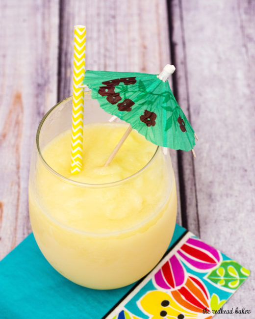 Have a taste of the tropics with a homemade frozen pina colada: a blend of ice, pineapple slices and juice, coconut cream and rum. #SundaySupper TheRedheadBaker.com