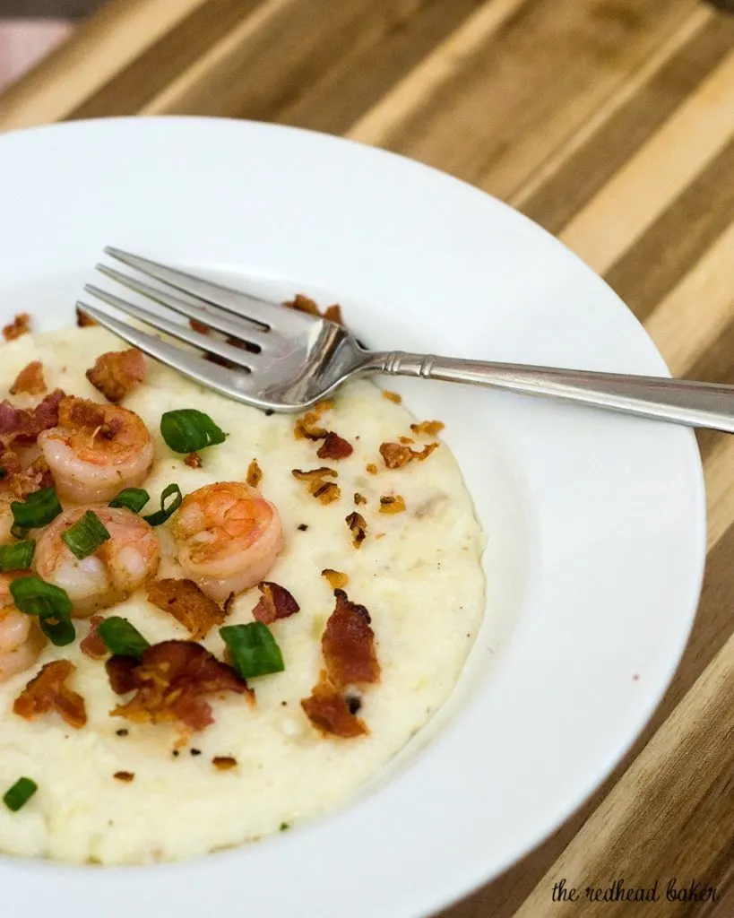 Shrimp and grits are a traditional southern breakfast. Sauteed shrimp are served over grits flavored with sharp Cabot cheddar cheese. #BrunchWeek TheRedheadBaker.com